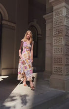 Load and play video in Gallery viewer, Sacha Drake - Sunset Chase Wrap Dress
